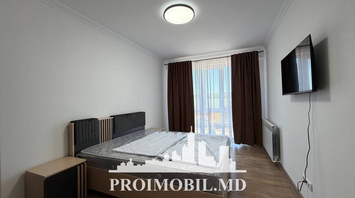https://images.proimobil.md/16RXFeirJurS0cwQtNyH9GCXcFBVuodfOjbSkV6ZmUA/watermark:0.75:so:0:30:0.39/resize:fill:1460:816:1/gravity:ce/bG9jYWw6Ly8vZXN0YXRlL2xyLzY3ZmZjZTIxLWY1MjMtNGUwZS05MDQ3LTQ5MzI4ZTJmZWZkMS5qcGVn
