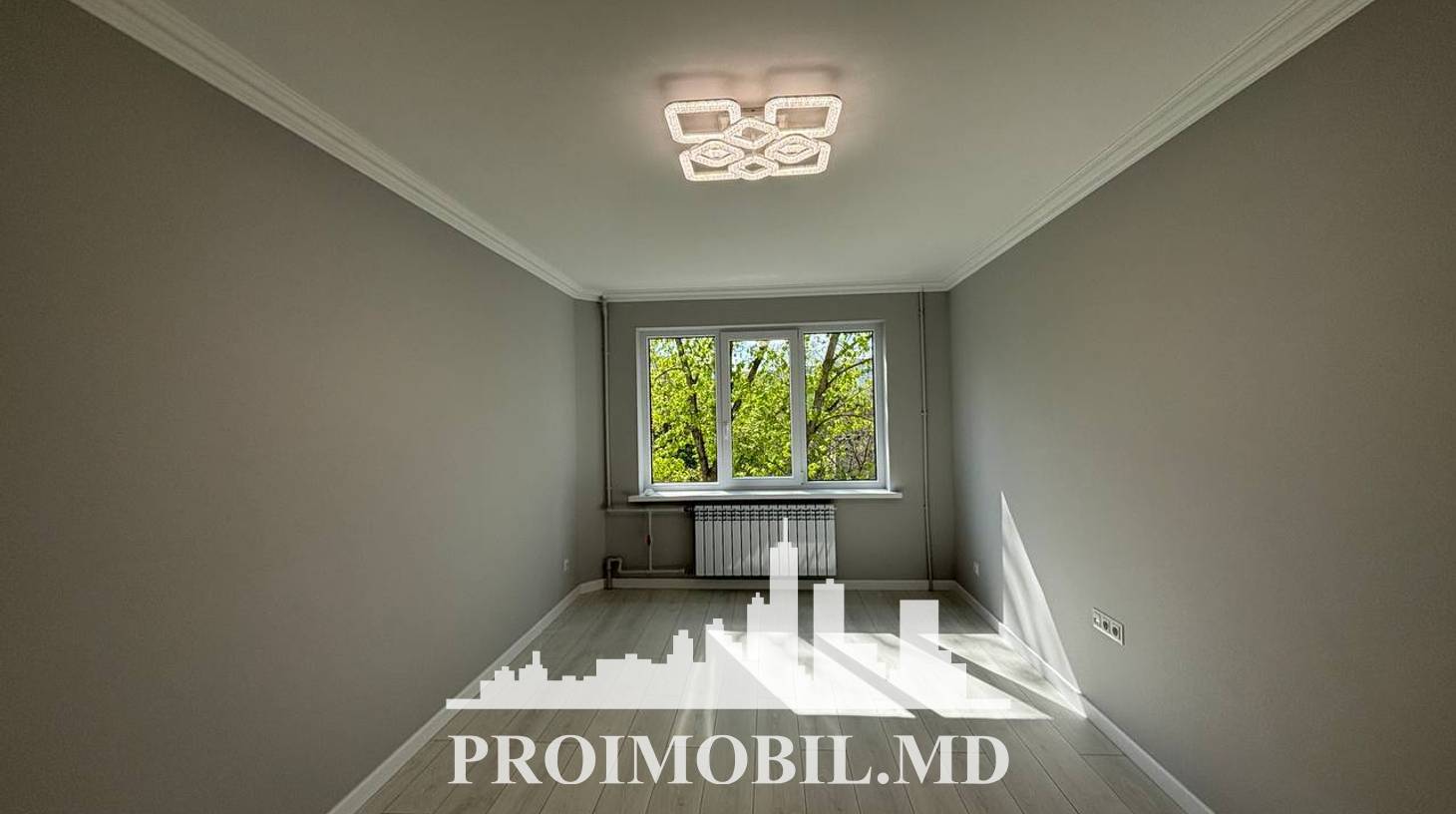 https://images.proimobil.md/73m0FBoNe2wxoEN3kSBv73q1bNhorEtDrb6wnJJy86g/watermark:0.75:so:0:30:0.39/resize:fill:1460:816:1/gravity:ce/bG9jYWw6Ly8vZXN0YXRlL2xyLzRmM2YyN2M3LWNiNDEtNDUyOS05NDlmLTkwOGZjZmI1MjgyZi5qcGVn
