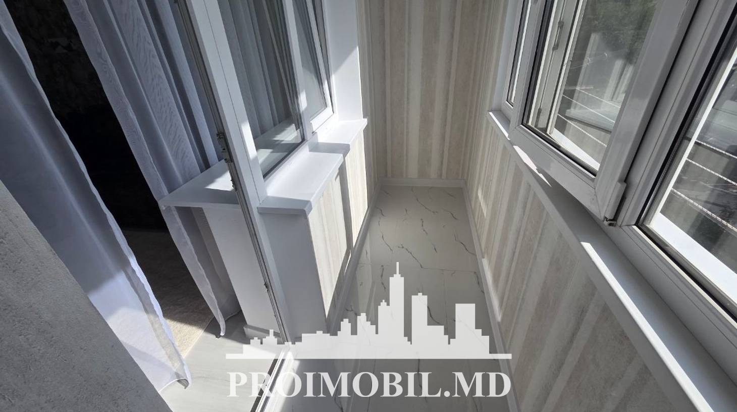 https://images.proimobil.md/7PQLx95F6Dv-0M_h8PAu34y1RGQi1ZenZFQ3U7gB2s4/watermark:0.75:so:0:30:0.39/resize:fill:1460:816:1/gravity:ce/bG9jYWw6Ly8vZXN0YXRlL2xyLzFiMWEwNzlmLTcwMDYtNDExYS1iMjRkLWEyYjZhOTUyNDY2Mi5qcGVn