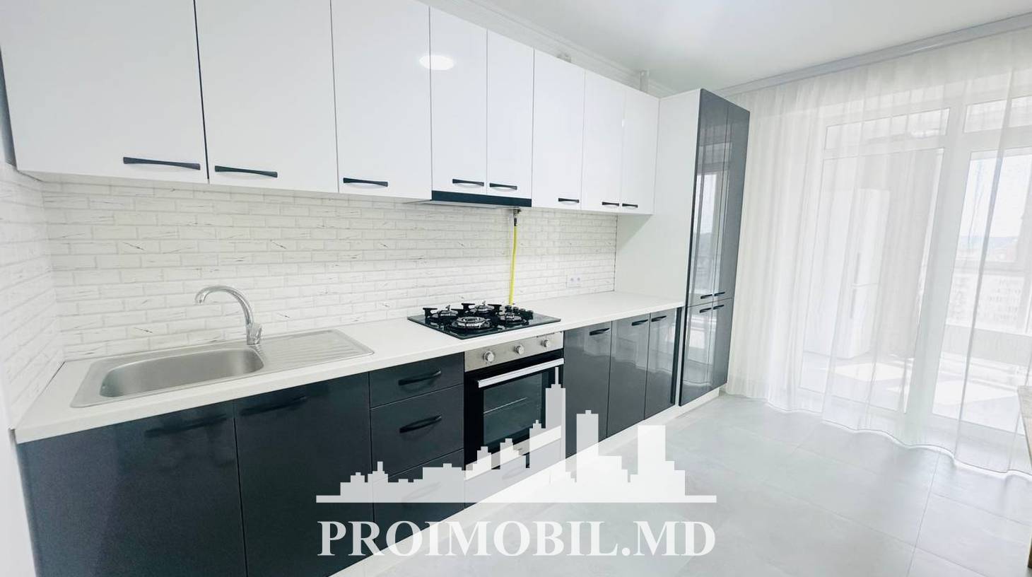 https://images.proimobil.md/8wEsmA5h4pHtwrRxqo_U8R4x1KnK33EzsFQcvkeJ7TE/watermark:0.75:so:0:30:0.39/resize:fill:1460:816:1/gravity:ce/bG9jYWw6Ly8vZXN0YXRlL2xyL2QxZmZiOGM1LTA2NmMtNDhhMS1hMzM0LTczY2IwOWM3NDhmMC5qcGVn