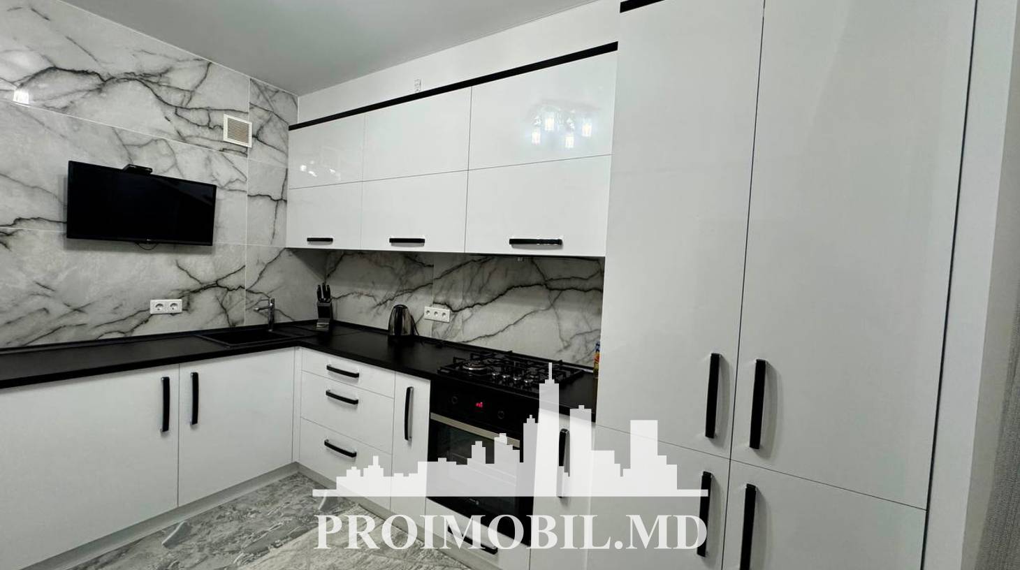 https://images.proimobil.md/9duqPuqqlS5HDjJf4U7y79T_OcnDrCt7kVEjx1wIiWQ/watermark:0.75:so:0:30:0.39/resize:fill:1460:816:1/gravity:ce/bG9jYWw6Ly8vZXN0YXRlL2xyLzBiM2Q0OGIxLTI0NzItNGExOS05YWE2LWM3MzFmYjFlZjI5ZS5qcGVn