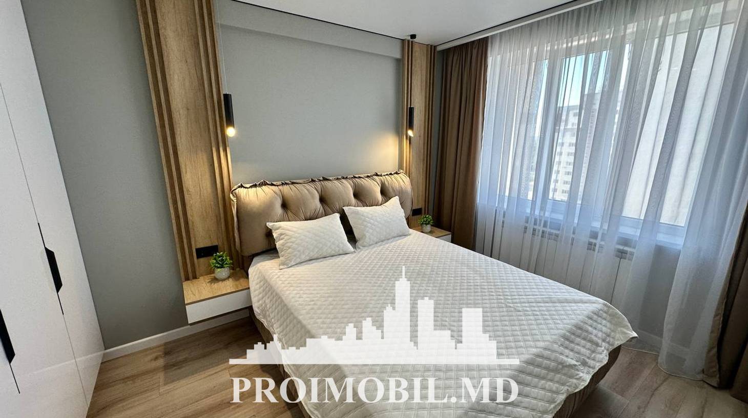 https://images.proimobil.md/B3B1H-zqMRfBtZmf8LBzovkUlIdXZS_fFBlYfK8Z7q4/watermark:0.75:so:0:30:0.39/resize:fill:1460:816:1/gravity:ce/bG9jYWw6Ly8vZXN0YXRlL2xyLzg3OGYxMGU0LTllYmUtNGIwZS1iZjIxLWVhM2MyMTNjNjE0Yi5qcGVn