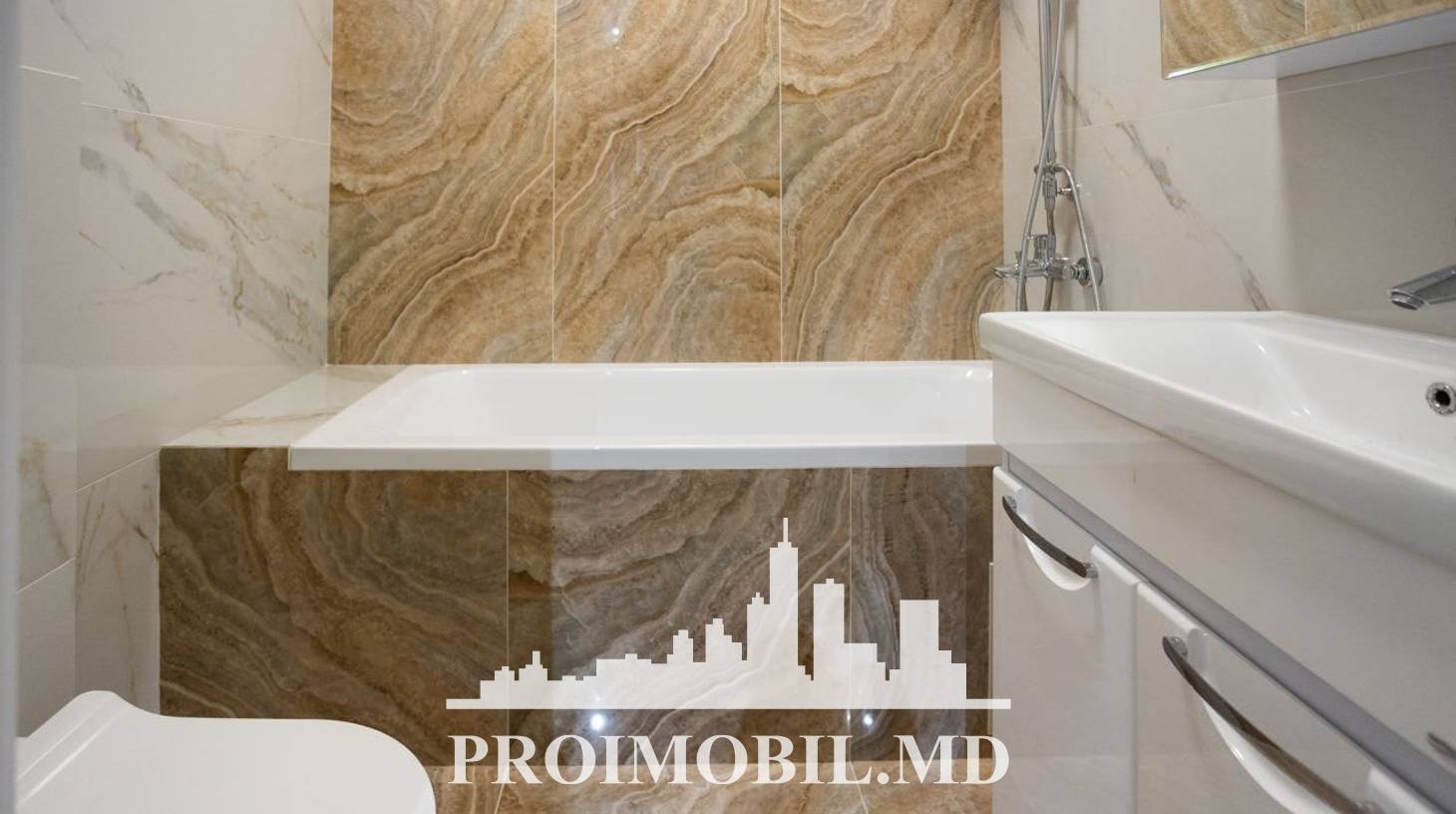 https://images.proimobil.md/Di2NrDvOLIxpJNuacEz_xzM_EfZuBAwwxN3I5n3QgV4/watermark:0.75:so:0:30:0.39/resize:fill:1460:816:1/gravity:ce/bG9jYWw6Ly8vZXN0YXRlL2xyLzc4OGE5ODQ1LTI0MGQtNDA2OS05NzI3LWQxNDM5M2VjOThlZC5qcGVn
