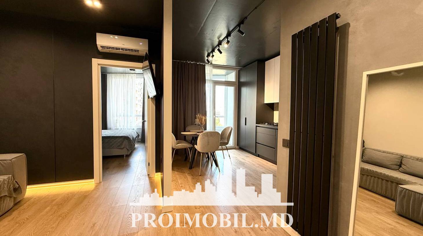 https://images.proimobil.md/E5ueNezs0a5KmwN75fF74hQIJZEflgS9GZlm9GJ5qFY/watermark:0.75:so:0:30:0.39/resize:fill:1460:816:1/gravity:ce/bG9jYWw6Ly8vZXN0YXRlL2xyLzY2ZjllYjFiLWU3YjYtNDQyYS04MzBlLWY2OTJlYmRhZDA2OS5qcGVn