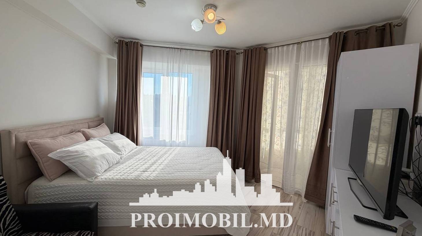 https://images.proimobil.md/JVOW8mj5ZJXWqkqzEQth_HWIQscde3qjY5Lgmb-dpmg/watermark:0.75:so:0:30:0.39/resize:fill:1460:816:1/gravity:ce/bG9jYWw6Ly8vZXN0YXRlL2xyLzkzM2Q1NDgxLWRjNWEtNDk5Yy04MThiLTkwNGNiOTYzYWM4YS5qcGVn
