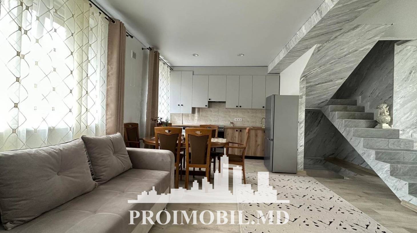 https://images.proimobil.md/LM4dQUxKM4ex11eGvKOxO6s4ySLAVJ_qaMG7F_qUeCA/watermark:0.75:so:0:30:0.39/resize:fill:1460:816:1/gravity:ce/bG9jYWw6Ly8vZXN0YXRlL2xyLzFkNzhmMmM4LWE1ZDUtNDJlNy04MTkyLTc5Mzk0ZGExZTk4Ni5qcGVn
