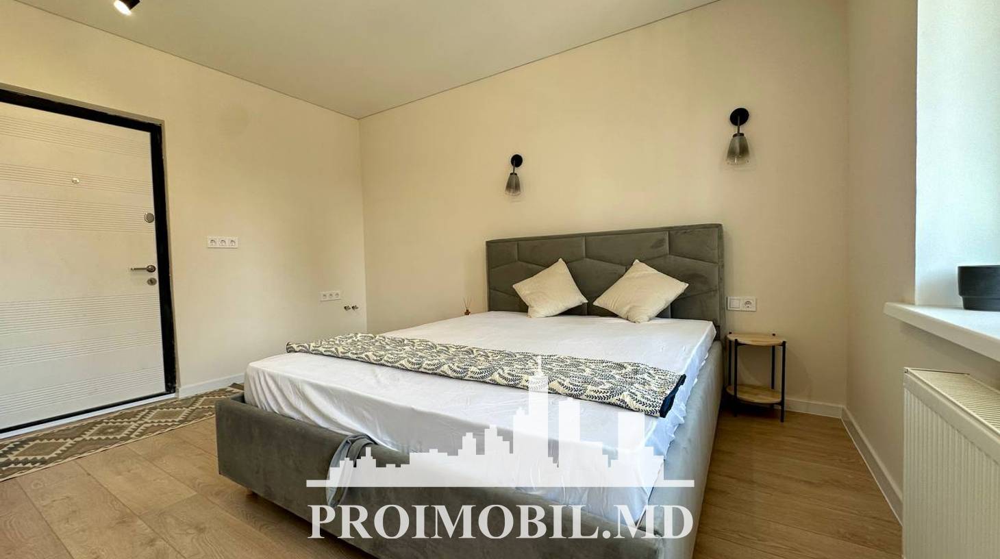 https://images.proimobil.md/Le47HE99j2hrzErLx1Vnw7QMU1xLOzMSyuzt7xlB9ms/watermark:0.75:so:0:30:0.39/resize:fill:1460:816:1/gravity:ce/bG9jYWw6Ly8vZXN0YXRlL2xyLzAzY2EyNzRhLTJhNTctNDYwZi04YTZjLTdlNGQyOTBiYjU3MS5qcGVn