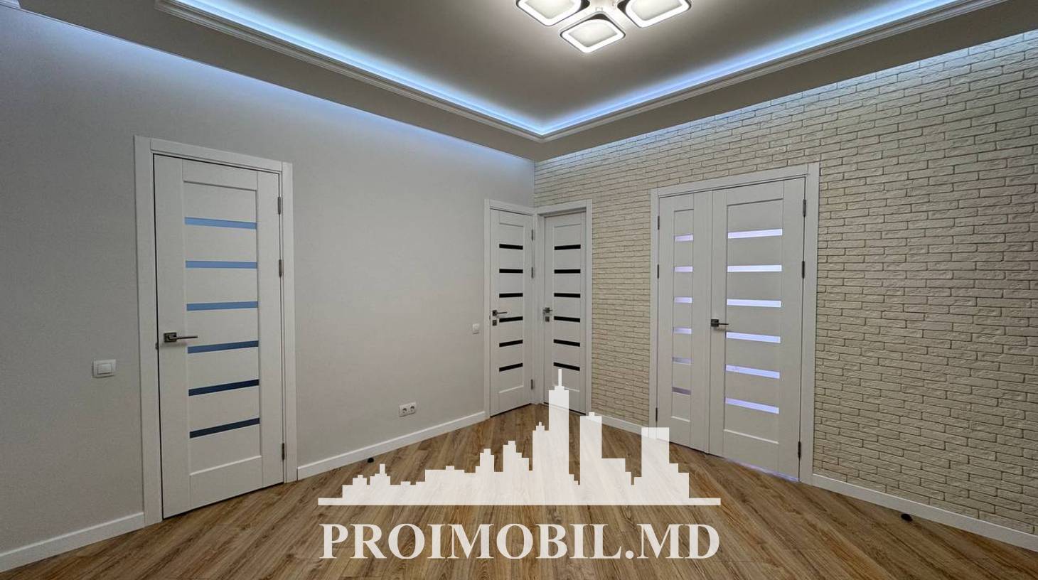 https://images.proimobil.md/MaYJFJW1Ba-2heLGdx5kbqgJktow2MnRoS0Sz5QQ3Hc/watermark:0.75:so:0:30:0.39/resize:fill:1460:816:1/gravity:ce/bG9jYWw6Ly8vZXN0YXRlL2xyLzllZTE3ZjIxLTlmM2YtNDU5Ny1iM2JmLTMzMGU5NDU1YjY3OC5qcGVn