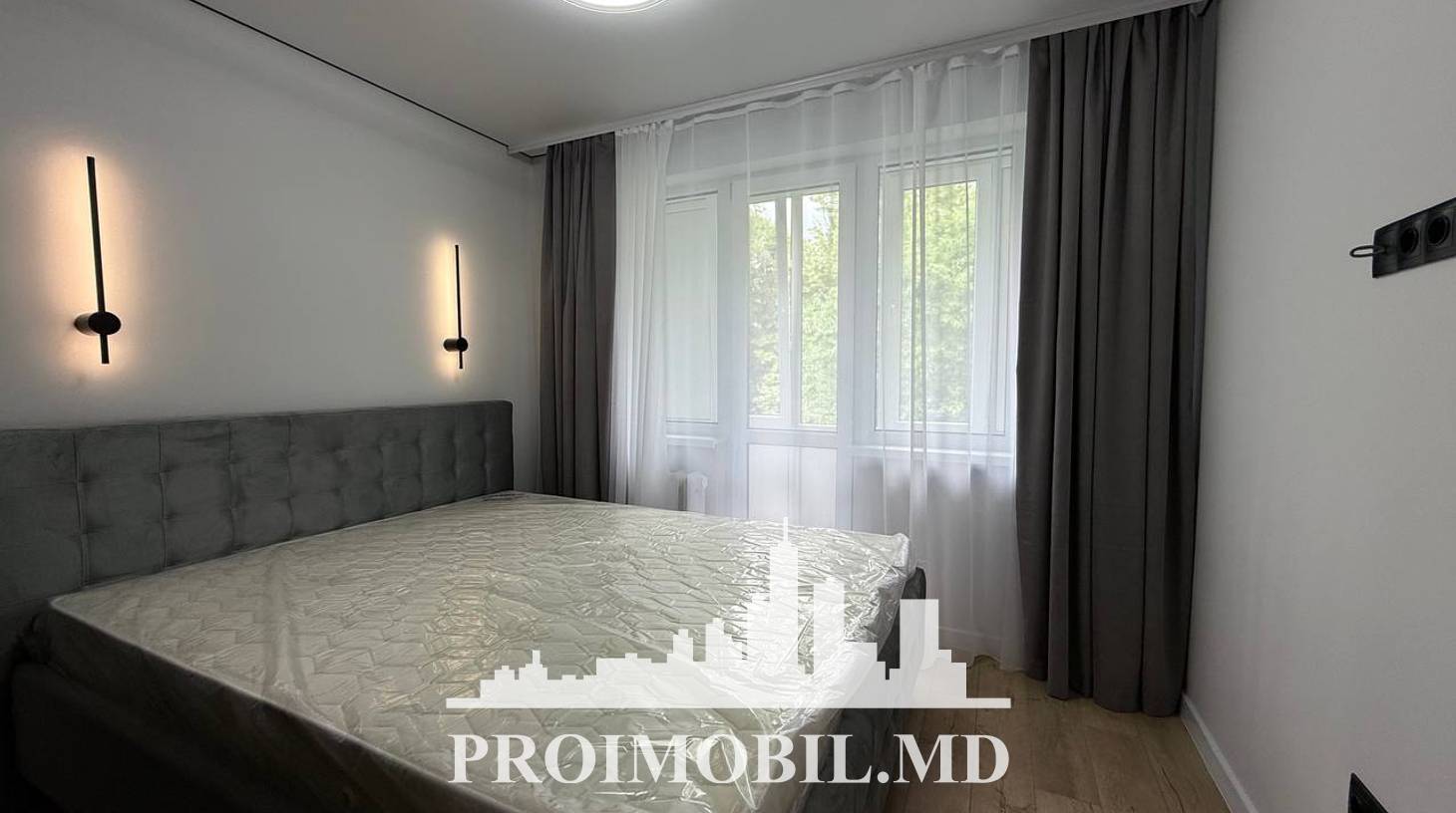 https://images.proimobil.md/OEiFx0xkZvKSoE8_jXaH0mSqCM0lW3p4DaUDJdPpVqI/watermark:0.75:so:0:30:0.39/resize:fill:1460:816:1/gravity:ce/bG9jYWw6Ly8vZXN0YXRlL2xyLzhmNmMxNDNlLTM5MzEtNGQxMi04YmY3LWMwZmMxNDJmMTI4Yi5qcGVn