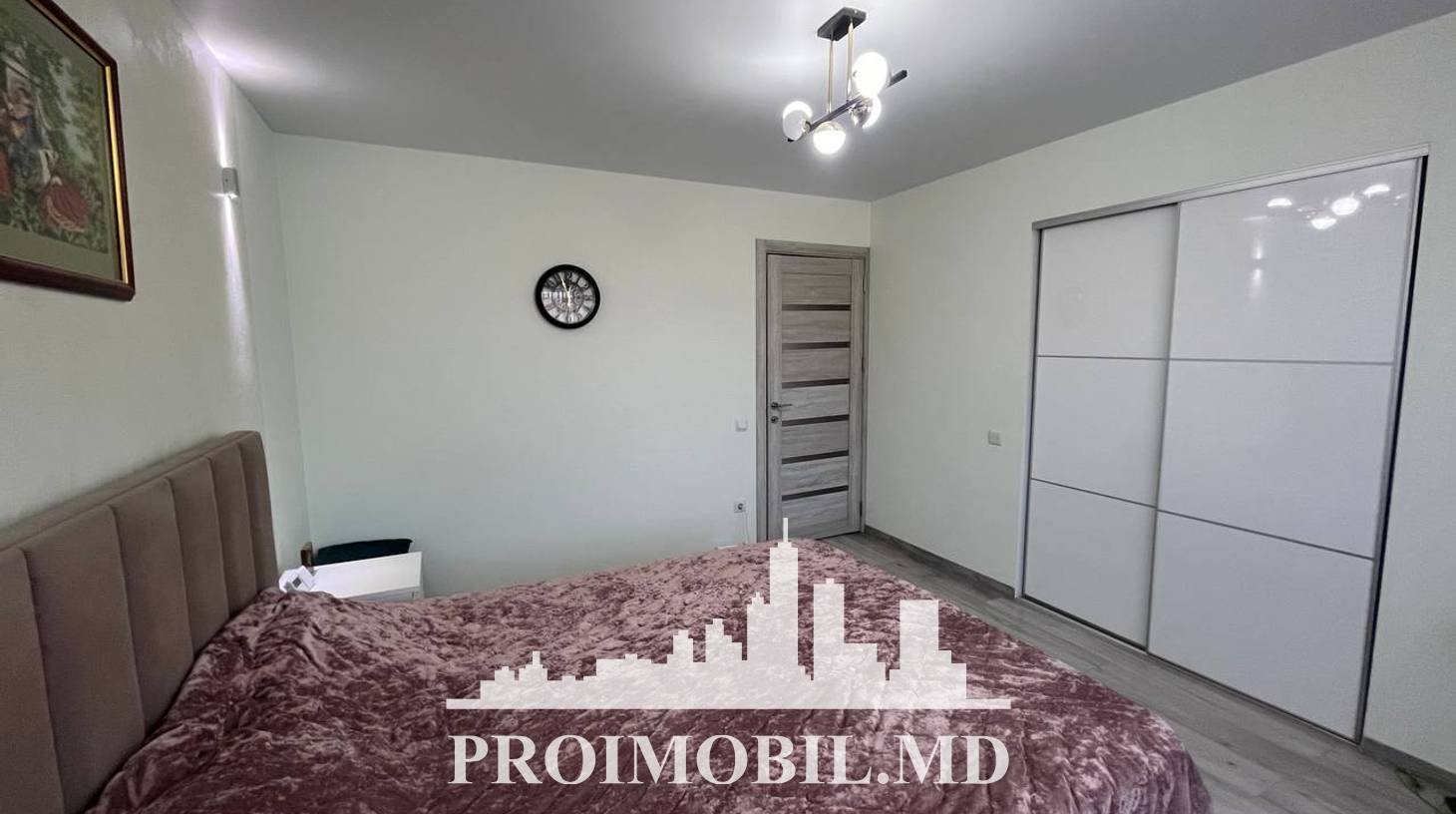 https://images.proimobil.md/R12UuQ_MiNBio3ECkIXog_jd2ffkZS5-FY_a-rY3orw/watermark:0.75:so:0:30:0.39/resize:fill:1460:816:1/gravity:ce/bG9jYWw6Ly8vZXN0YXRlL2xyLzk0ZDVmMGUxLWZkNDAtNDQ2MC05NDc1LTkxNmFlOGI0NjBlNy5qcGVn