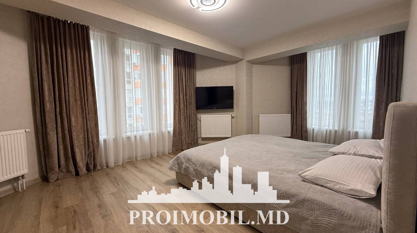 https://images.proimobil.md/RiL-_WPwN7xWQ4JJC6mwoJc9PP_e1eoHcAHME_3Is_k/watermark:0.75:so:0:30:0.39/resize:fill:1460:816:1/gravity:ce/bG9jYWw6Ly8vZXN0YXRlL2xyL2Q5MGMyNjM1LWFmY2QtNDc0NS04N2QxLWQ1MDI3NmUzOTZmOS5qcGVn