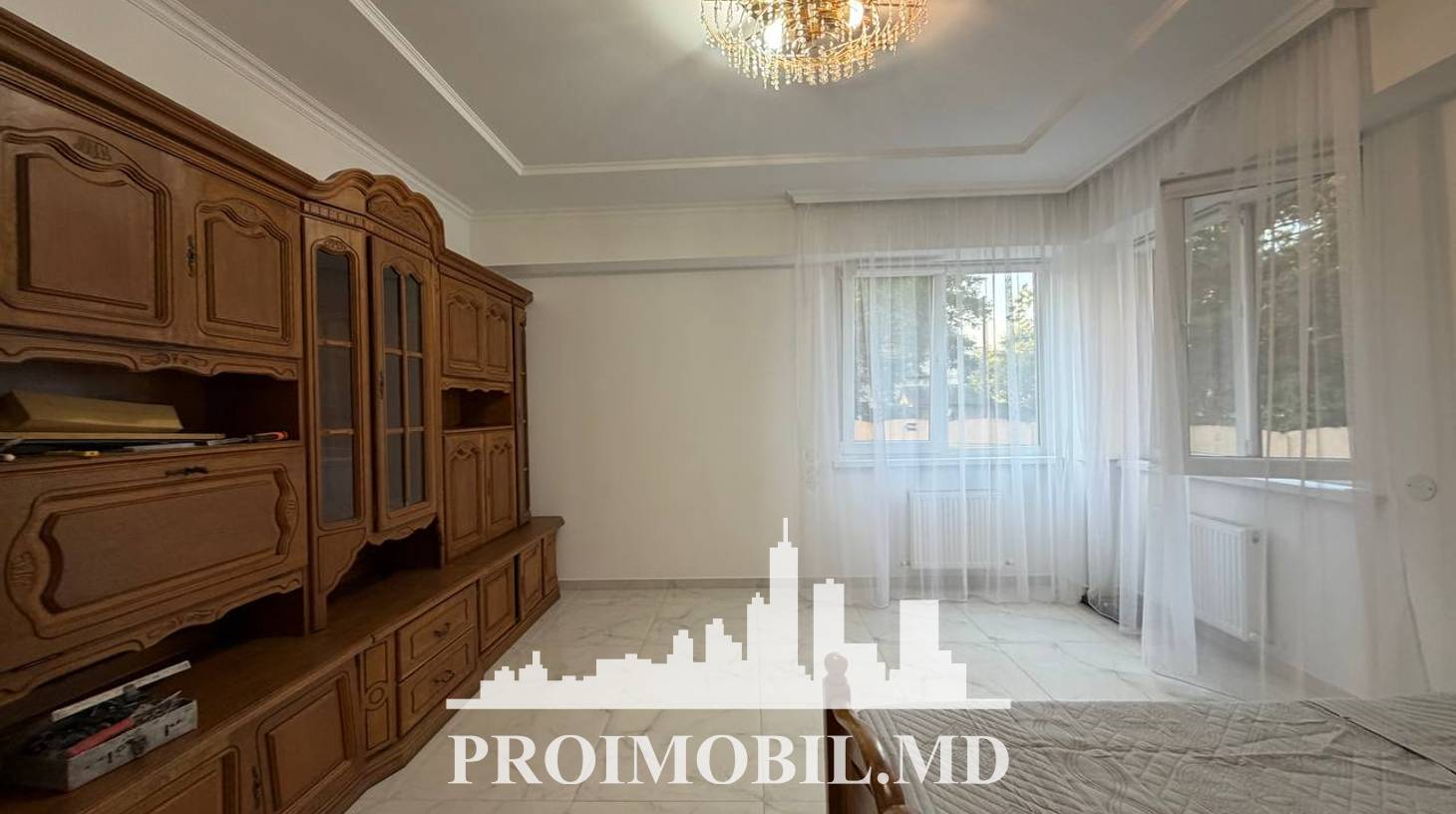 https://images.proimobil.md/SuMYhLqzXk59ZCi-Zet56l404dBPKMv7Adac4k3Th7Y/watermark:0.75:so:0:30:0.39/resize:fill:1460:816:1/gravity:ce/bG9jYWw6Ly8vZXN0YXRlL2xyLzNjODRkNDQ2LTQ5M2UtNGEwNy1iZjVhLTU1YjAwMTQ3MDdjZC5qcGVn