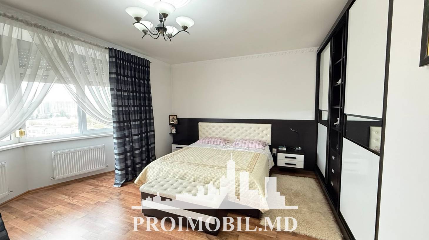 https://images.proimobil.md/VHtgLXft_CD9d-dJlMwtVW6tsTBr96RDR3OoEZ4RK8I/watermark:0.75:so:0:30:0.39/resize:fill:1460:816:1/gravity:ce/bG9jYWw6Ly8vZXN0YXRlL2xyLzlmZmYwNGJiLWQxNjctNGRhYi1iZTU1LTg1MTk2ZWY5NmY5Zi5qcGVn