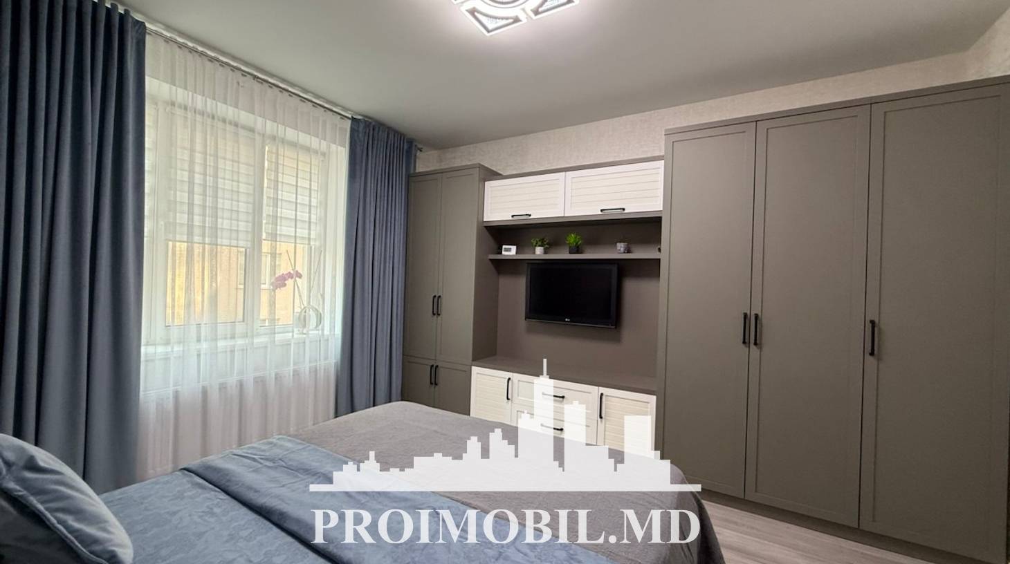 https://images.proimobil.md/WBpgJT-F3-uUANn4d950CrnBF9iToQB6eo9dLtSMR0Q/watermark:0.75:so:0:30:0.39/resize:fill:1460:816:1/gravity:ce/bG9jYWw6Ly8vZXN0YXRlL2xyLzRmOGI5NGQ4LWI5NDAtNDU0YS05Y2M2LTA3YWI5MzlmNmYxMi5qcGVn