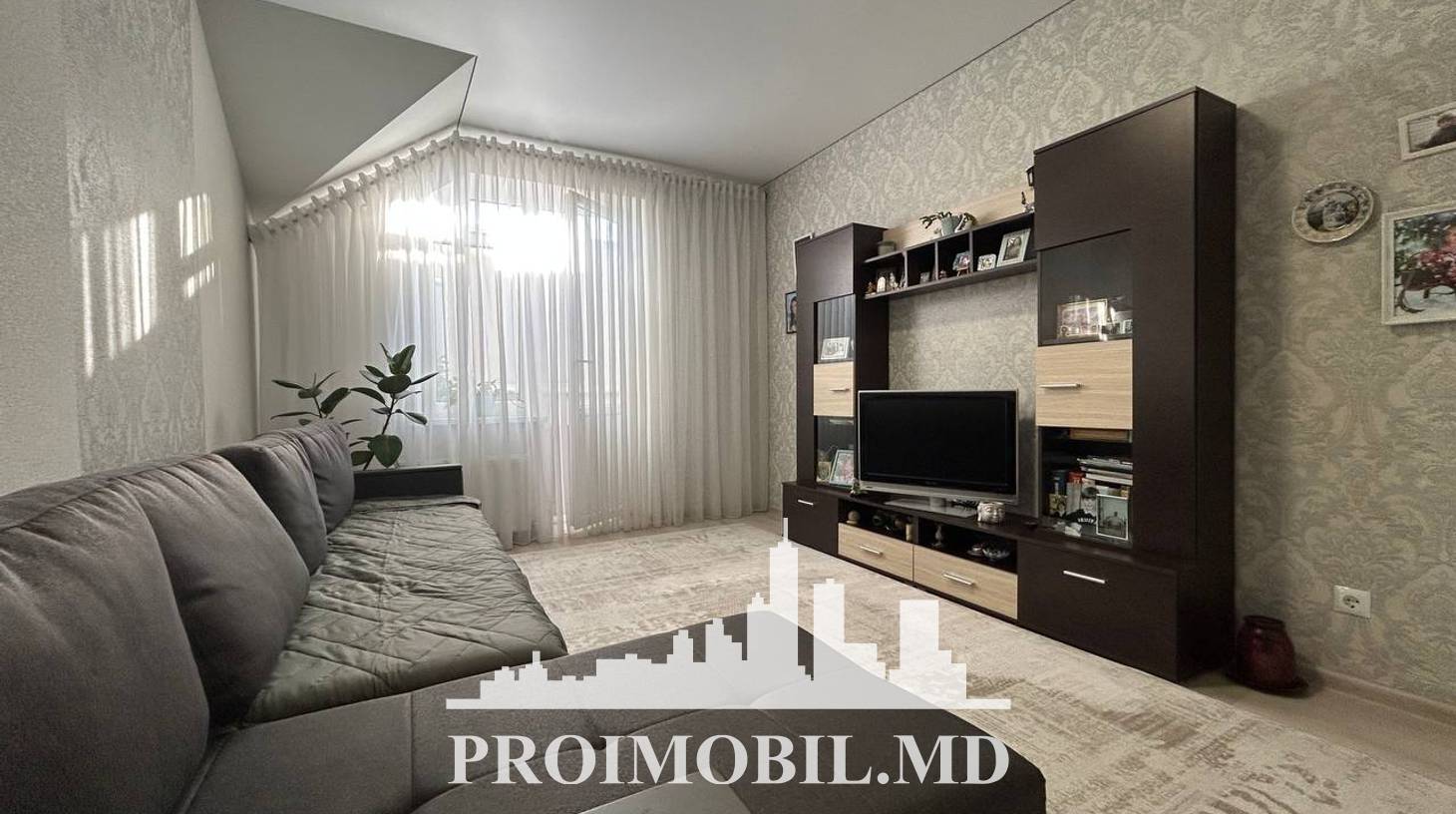 https://images.proimobil.md/WkhzV0omySBWLbKxGK0L4wytjVruOP7NcjbON_UxT74/watermark:0.75:so:0:30:0.39/resize:fill:1460:816:1/gravity:ce/bG9jYWw6Ly8vZXN0YXRlL2xyLzZjMTBiYTIzLTcyM2QtNGYxNS1hOTFmLTdiNzBiZmY3OTU3Zi5qcGVn