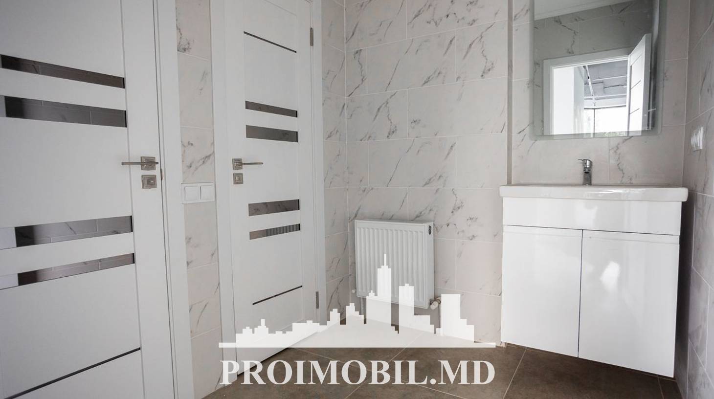 https://images.proimobil.md/XL-9cwHYe6zu5HzE39GLg16YfnX3M-zodnmYzUw3Kpw/watermark:0.75:so:0:30:0.39/resize:fill:1460:816:1/gravity:ce/bG9jYWw6Ly8vZXN0YXRlL2xyLzdiYjRjMTM3LWNhZWMtNDMyOC05MWNiLWJlMjE0ZmFiYWU3Ni5qcGVn