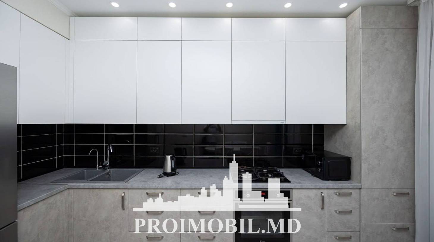 https://images.proimobil.md/Xmf9tzqHSCdI1bD0Egs4J-Oo-TqKr4uY2I6bJDCW_KA/watermark:0.75:so:0:30:0.39/resize:fill:1460:816:1/gravity:ce/bG9jYWw6Ly8vZXN0YXRlL2xyLzZhN2MzZjg3LWNkZjAtNGYyNy1iZTkzLTE4M2E0ZWRjY2JmMS5qcGVn