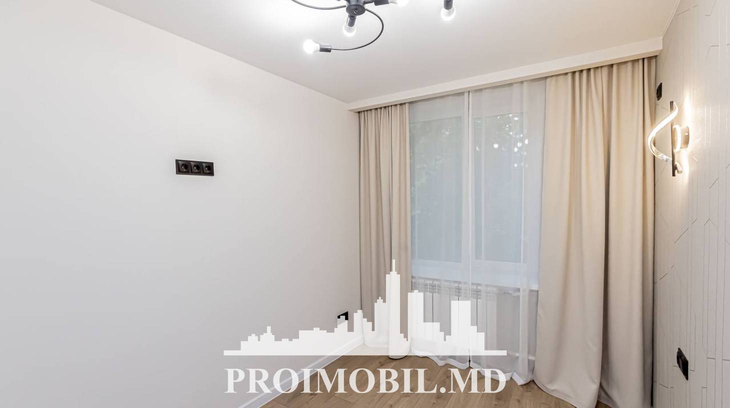 https://images.proimobil.md/XvXm9uEN9CEbDYz-mKqFGX_YWyuh-af703PkOcLDZtc/watermark:0.75:so:0:30:0.39/resize:fill:1460:816:1/gravity:ce/bG9jYWw6Ly8vZXN0YXRlL2xyLzkxODI2MGI1LTM1NGUtNGQ5MC1iYzI0LTYyOTNjMGM5Zjc3OC5qcGVn