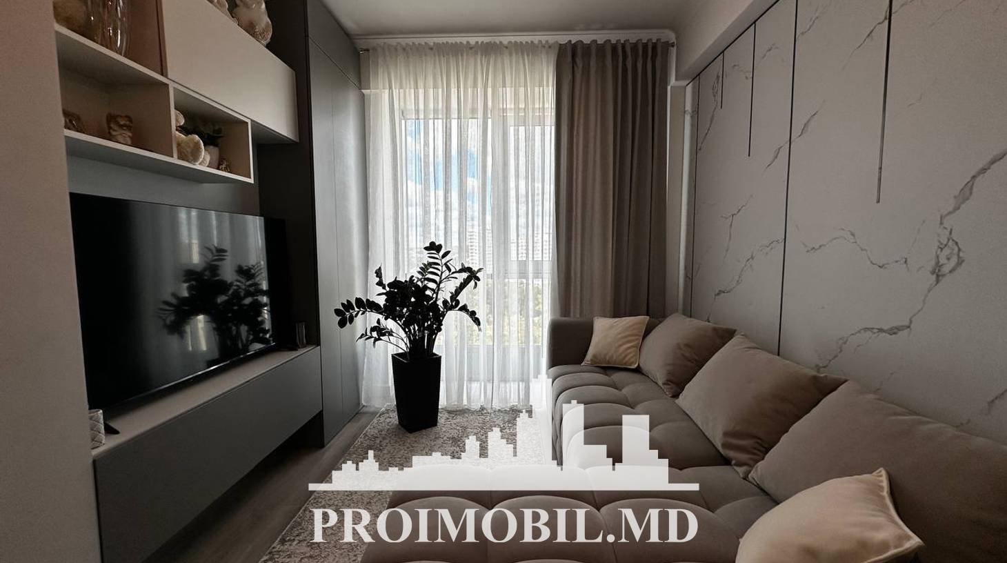 https://images.proimobil.md/YpaUXP8Ao_xqY0pK1z6_BGh_8W8w4af9owDb5s0Ss40/watermark:0.75:so:0:30:0.39/resize:fill:1460:816:1/gravity:ce/bG9jYWw6Ly8vZXN0YXRlL2xyL2YyMWZmMmE2LTJiZTktNDdmNi1iMjc4LTIwMjdkN2VjZTdlNi5qcGVn