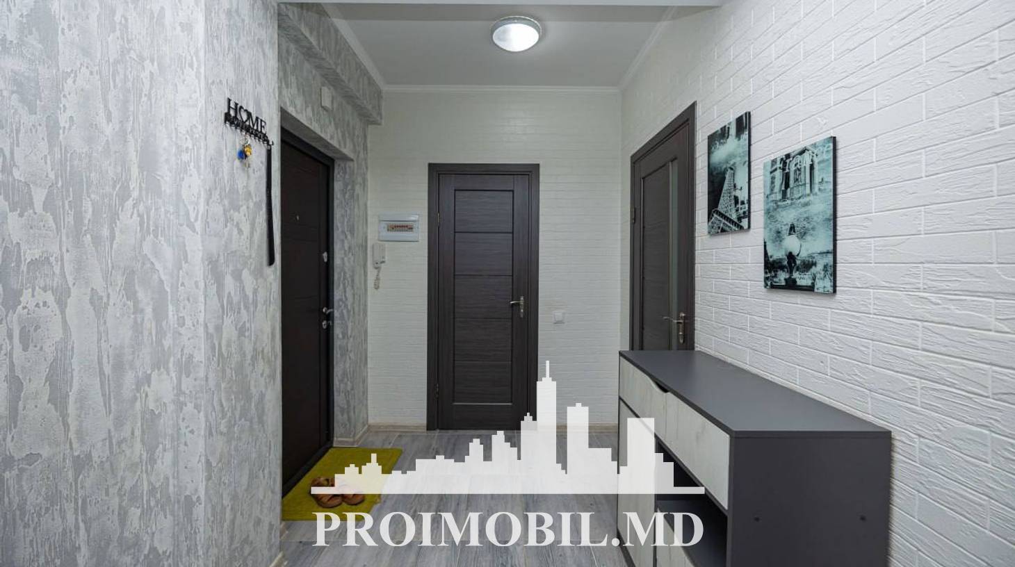 https://images.proimobil.md/ZAX-6UiMBtIidSe7a6vxGTZVYy5rMrL65xW38_HqIkQ/watermark:0.75:so:0:30:0.39/resize:fill:1460:816:1/gravity:ce/bG9jYWw6Ly8vZXN0YXRlL2xyLzA2MTk4YThkLTRiMDUtNDE0Ny05ZGRkLTI2MTBjMDdhOGU2Yi5qcGVn