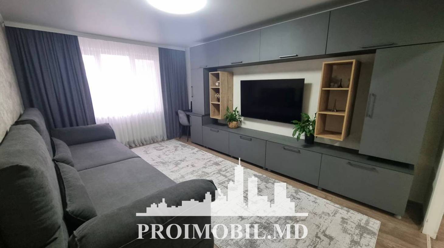 https://images.proimobil.md/_tZYrm6hZNIPckgq5s5VvDgIPv--Q25EM86Pde212rU/watermark:0.75:so:0:30:0.39/resize:fill:1460:816:1/gravity:ce/bG9jYWw6Ly8vZXN0YXRlL2xyL2Y4MGJkNzZiLTEyMzMtNDgwNS04ZDI2LWYzMjQzNTBjMTM0MC5qcGVn