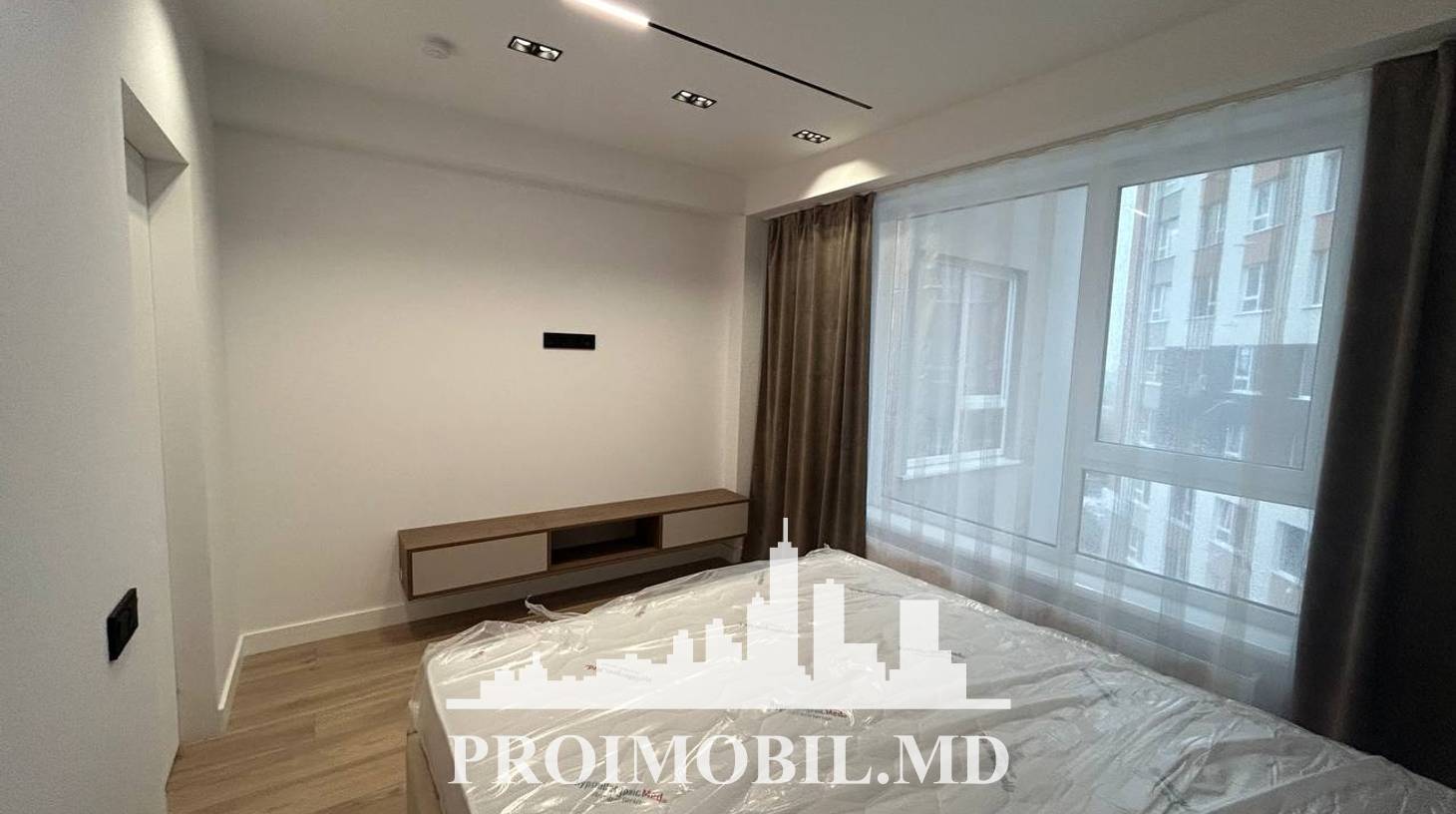 https://images.proimobil.md/aTAPP5Z8lE3MSCSwNZTN14xmo_1HYRpDqTxGlMJrsC8/watermark:0.75:so:0:30:0.39/resize:fill:1460:816:1/gravity:ce/bG9jYWw6Ly8vZXN0YXRlL2xyLzc4MDNkMmQ4LTI5Y2YtNDI3OS1hYTYyLTAyM2IxMTMyNmYyNy5qcGVn