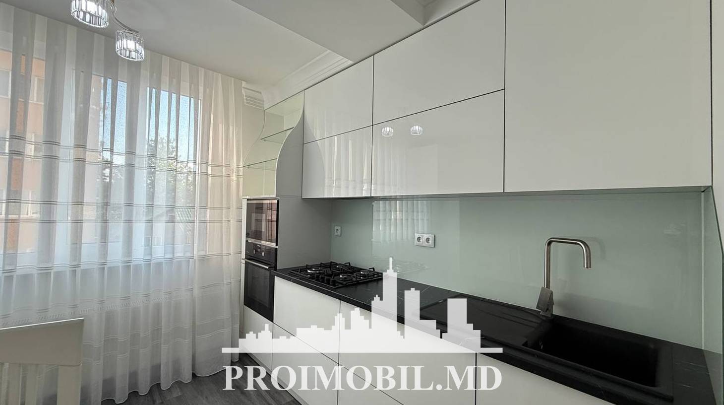 https://images.proimobil.md/ahFog6puRvza0pGLLzizQtLkdXuEDQhYy_wqdcZS5Rs/watermark:0.75:so:0:30:0.39/resize:fill:1460:816:1/gravity:ce/bG9jYWw6Ly8vZXN0YXRlL2xyLzBiNmFhZjZkLTEzNTEtNGQwNS1iZTRkLTgzOWMwZTY5YjFjYS5qcGVn