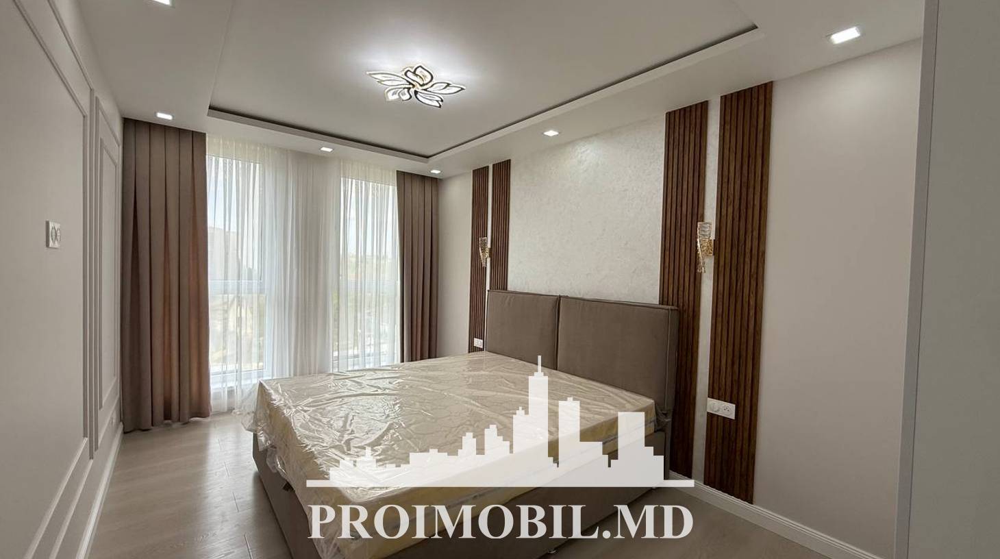 https://images.proimobil.md/b6U8HJZw7XgwuTUdM73cbzEZI77Twn6Nwx4Th_3j4Mk/watermark:0.75:so:0:30:0.39/resize:fill:1460:816:1/gravity:ce/bG9jYWw6Ly8vZXN0YXRlL2xyLzE5YTJjYjkzLWExMTYtNDgxZi04MThjLTgwNDA0ZWVhZjdiNC5qcGVn