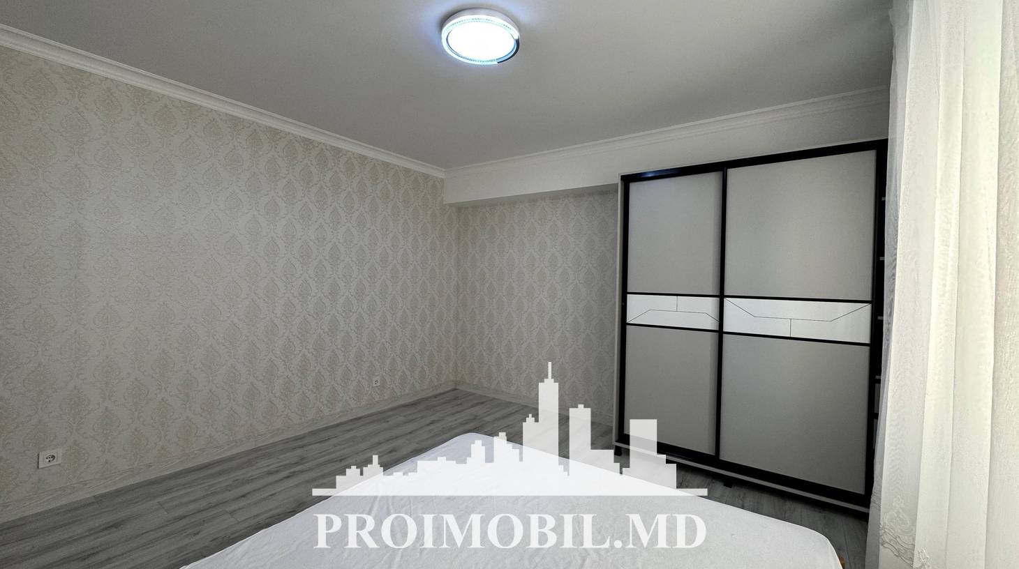 https://images.proimobil.md/cxddd5oedFxo2EVQ-APG2ZorlkCNwNdYuY75Kp6O50Y/watermark:0.75:so:0:30:0.39/resize:fill:1460:816:1/gravity:ce/bG9jYWw6Ly8vZXN0YXRlL2xyLzBhOTBmMDk3LWFhZTYtNDY5Ni1iMjFlLTdmYzJhNTJjNzlkNy5qcGVn