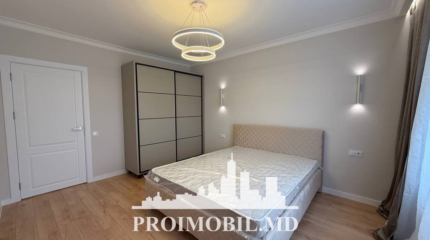 https://images.proimobil.md/do-C84I8NWFAnVQDPANXNY0Li0SMxzM90r2n9Q-eHfg/watermark:0.75:so:0:30:0.39/resize:fill:1460:816:1/gravity:ce/bG9jYWw6Ly8vZXN0YXRlL2xyLzNkNTUyY2UxLTA2MDQtNGI1Yi04ZDNmLTdlZTc5N2VkZDhmNy5qcGVn