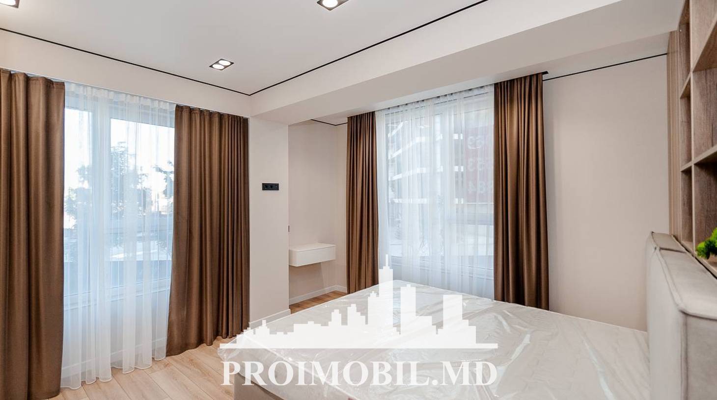 https://images.proimobil.md/eEdNLYjkNrntriw8oE3cfgseJ_9V2TVpt6LNJlNT1Rc/watermark:0.75:so:0:30:0.39/resize:fill:1460:816:1/gravity:ce/bG9jYWw6Ly8vZXN0YXRlL2xyLzliODg1NmIwLTAzNGItNDI2OC1iZDFkLTQyMTc4YWI1ZTZkMS5qcGVn