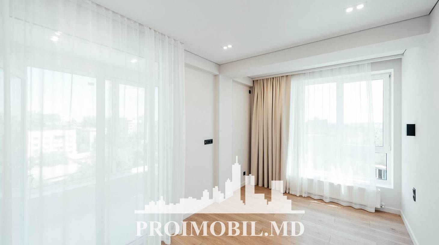 https://images.proimobil.md/h5kpt1sYk21wRONpHUK0R_FCejIzCeT2PAZQn25teNw/watermark:0.75:so:0:30:0.39/resize:fill:1460:816:1/gravity:ce/bG9jYWw6Ly8vZXN0YXRlL2xyLzVkM2UwYzJjLWE4YjQtNDhmOS1iZGZkLWUwYWQ1NDdiOTliOS5qcGVn