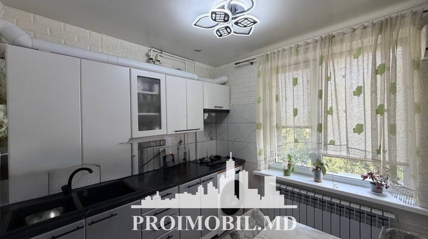 https://images.proimobil.md/iG7m7VzAL5kk65V-tvJlqegqemucFaMSy7aaDexKes4/watermark:0.75:so:0:30:0.39/resize:fill:1460:816:1/gravity:ce/bG9jYWw6Ly8vZXN0YXRlL2xyLzExMDczMjc0LWI5N2YtNDc4Zi1hODRhLTJmNDgyYzI1ODQzZi5qcGVn