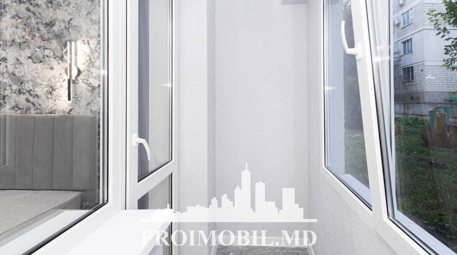 https://images.proimobil.md/lYjNlRjAyCnQZVeh3UUTWYmfA6p6dnRQlYf2IPdXlG8/watermark:0.75:so:0:30:0.39/resize:fill:1460:816:1/gravity:ce/bG9jYWw6Ly8vZXN0YXRlL2xyLzQyZjUyZDk2LWFkNDctNDlmYS1iZTcxLTUyN2M5ZmE2OWE5Yi5qcGVn