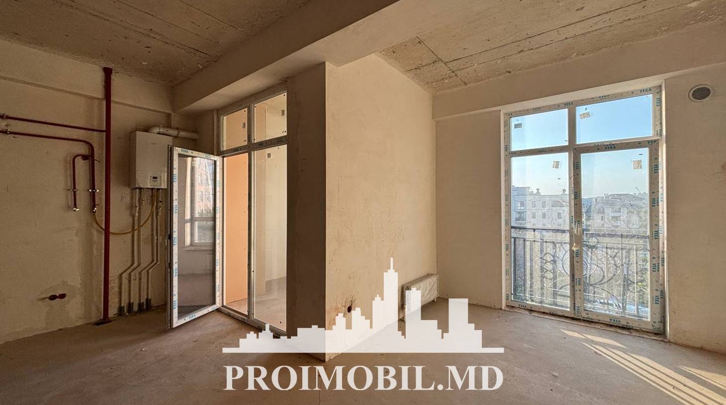 https://images.proimobil.md/n58wZxYOvJ7IyX7_i2CcXv-aHvJOKjl1sA8kkyoM9D4/watermark:0.75:so:0:30:0.39/resize:fill:1460:816:1/gravity:ce/bG9jYWw6Ly8vZXN0YXRlL2xyLzY0ZjM2MGI5LWRlMzAtNGFkNy04Mjk3LWE5OWEzZmM2MDZkYi5qcGVn