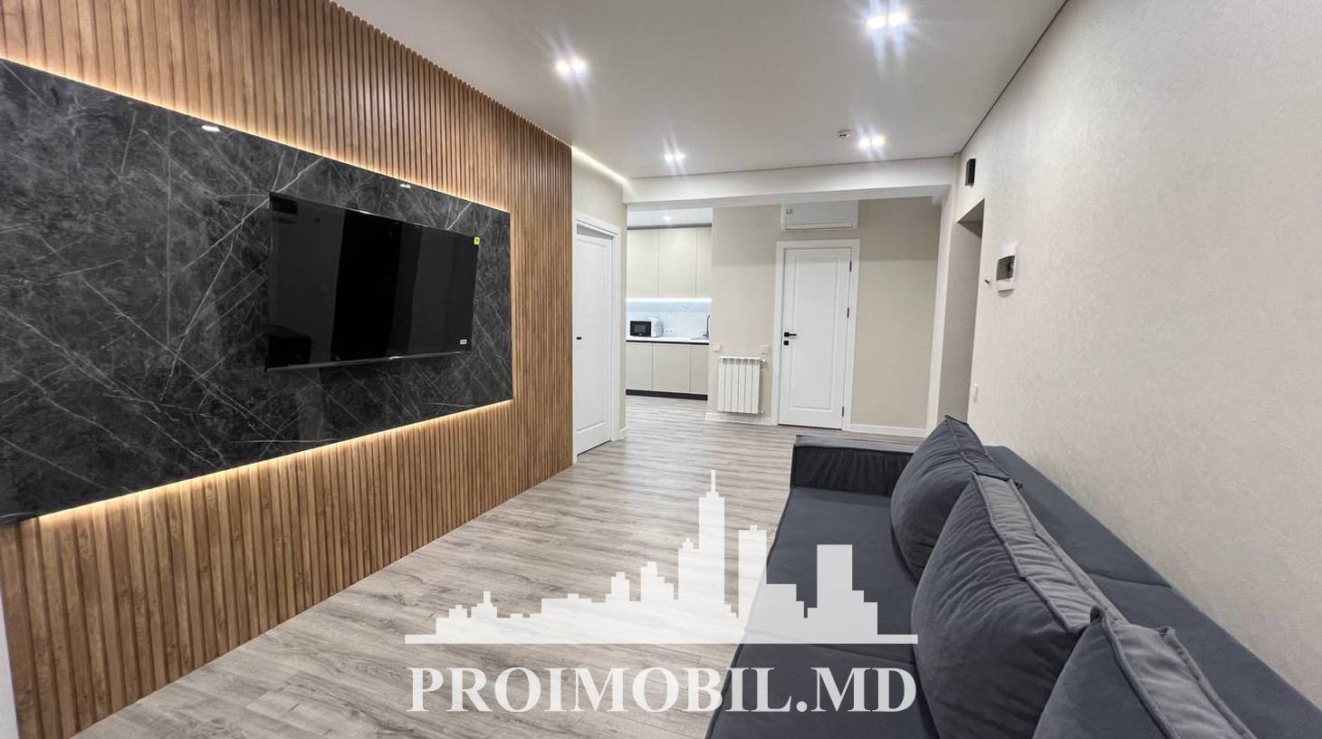 https://images.proimobil.md/nuQuSqV6yctpqxzRyLXQNq_umkNqjKnMerLoL3uuAyY/watermark:0.75:so:0:30:0.39/resize:fill:1460:816:1/gravity:ce/bG9jYWw6Ly8vZXN0YXRlL2xyLzcxZDFjNDE0LTJmNzYtNGE0NS04MjM0LTE0MzQyZTJiNDY4NC5qcGVn