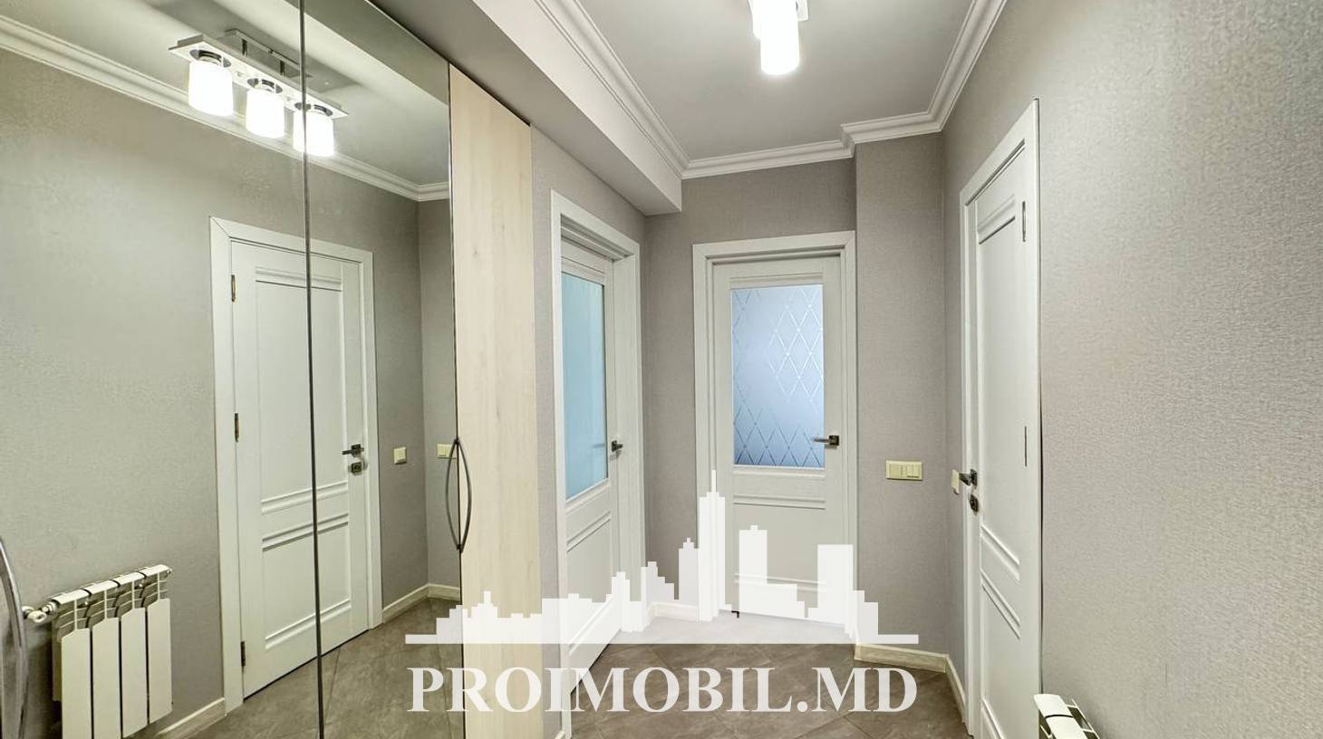 https://images.proimobil.md/pM_203WkRFP147XY5lTSDEH_9TTXPcWG9n_1X4r9V8A/watermark:0.75:so:0:30:0.39/resize:fill:1460:816:1/gravity:ce/bG9jYWw6Ly8vZXN0YXRlL2xyL2UzYmMxOTI2LTNjM2UtNGJhYS1hMTA2LThiNDkwMmVkNzdiYS5qcGVn