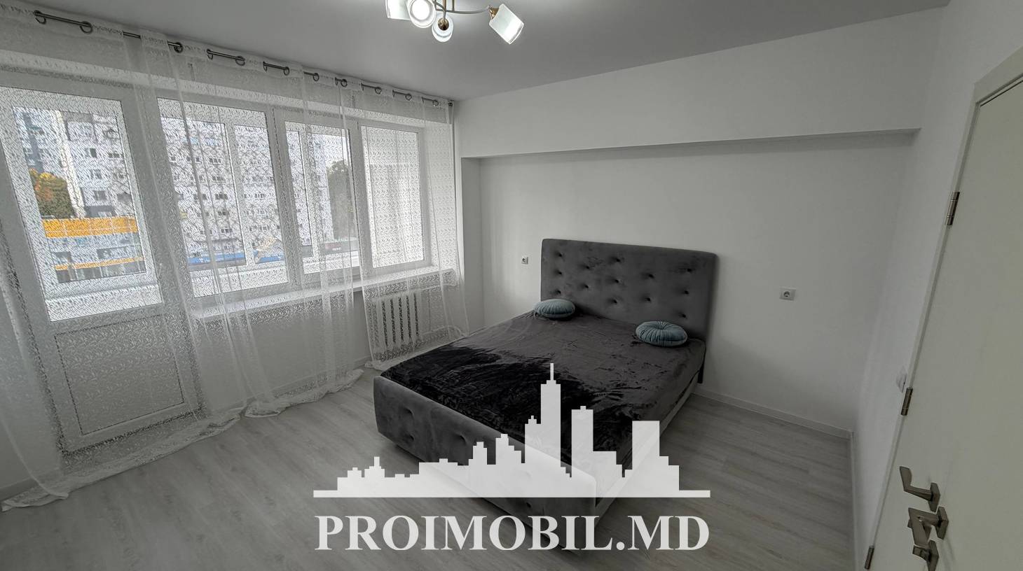 https://images.proimobil.md/pf7VG91mrr-QM0018q3YsjS2M3WJseqAN3Hdloeg1bI/watermark:0.75:so:0:30:0.39/resize:fill:1460:816:1/gravity:ce/bG9jYWw6Ly8vZXN0YXRlL2xyL2ExZDVkNzg0LTk2ZDctNGU3My05MDdlLWZmOTczMWY3ZDFjOS5qcGVn