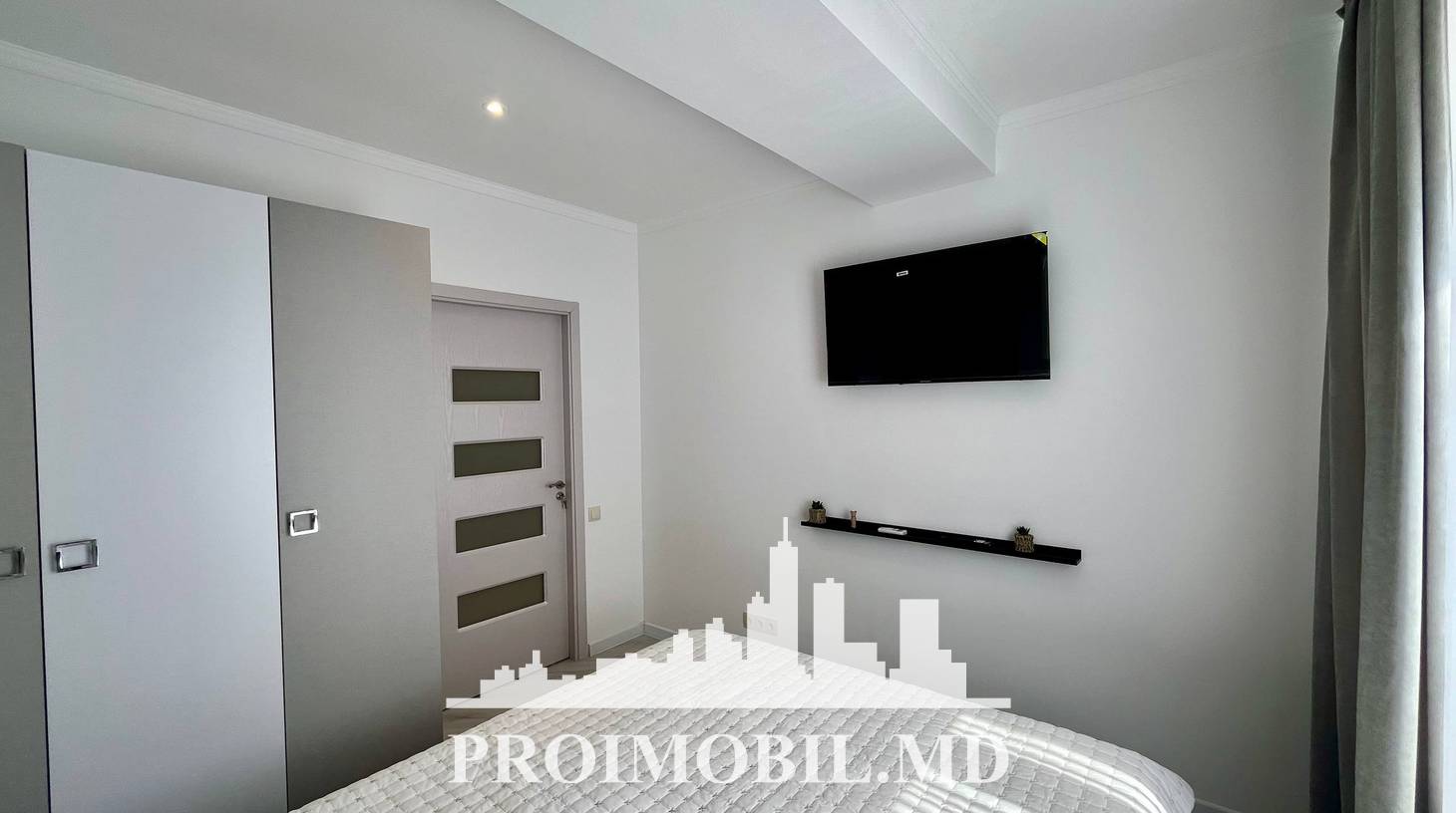 https://images.proimobil.md/rZNxxvbOG5r5TNk03rdos-6-puZ6svC6Rr2yMyuH4Vw/watermark:0.75:so:0:30:0.39/resize:fill:1460:816:1/gravity:ce/bG9jYWw6Ly8vZXN0YXRlL2xyLzA4NjgwMTA1LTMyYzMtNGQ5MS05Yjc2LThjODU4Njk5NWIzOS5qcGVn