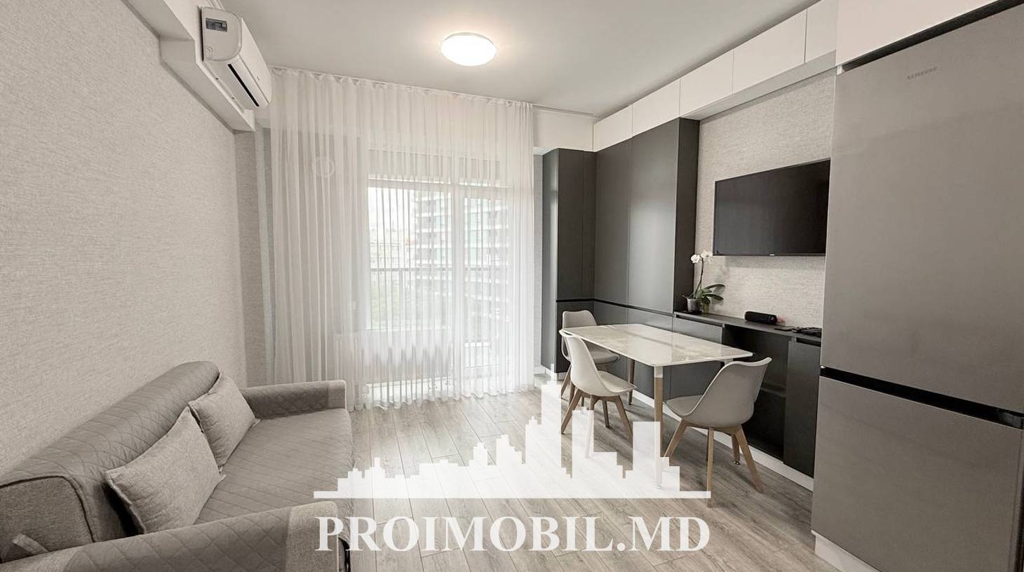 https://images.proimobil.md/sq3GlKg8KTU893JLXDBcf3-6ExGzGhe1nlpSovpzw0U/watermark:0.75:so:0:30:0.39/resize:fill:1460:816:1/gravity:ce/bG9jYWw6Ly8vZXN0YXRlL2xyL2JjMDk2NWJiLTczYTMtNDdjZC1iYzM3LWMxYjAzYTExODhlZC5qcGVn