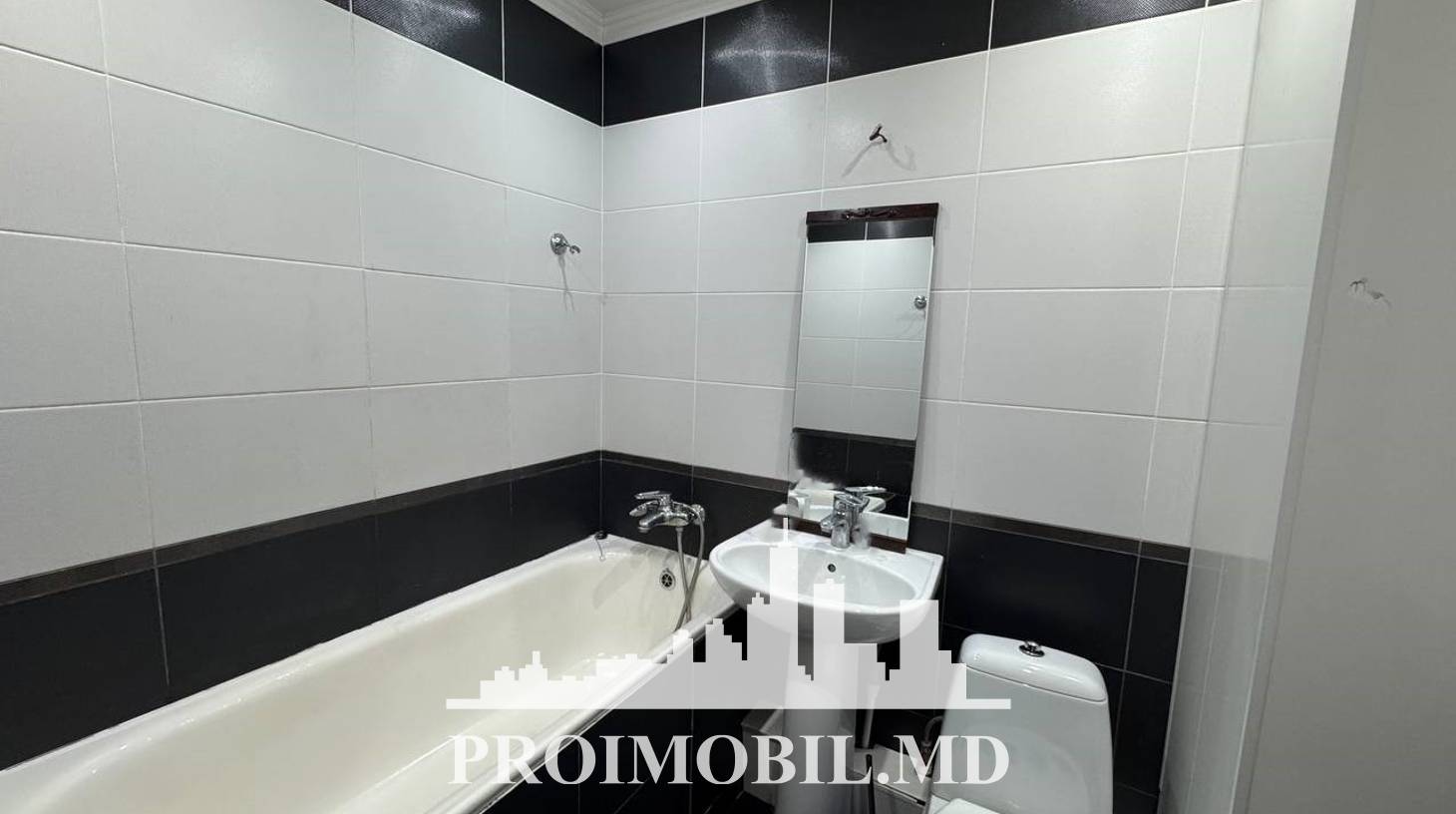 https://images.proimobil.md/tDQPWRoHVpec4HHUF94wMigqffMHBEGeQqP-tP6n8u0/watermark:0.75:so:0:30:0.39/resize:fill:1460:816:1/gravity:ce/bG9jYWw6Ly8vZXN0YXRlL2xyLzllOTIwYzI3LTdlMWQtNDE2MC05YTA1LWI1N2I5ZDE1MmE2MS5qcGVn