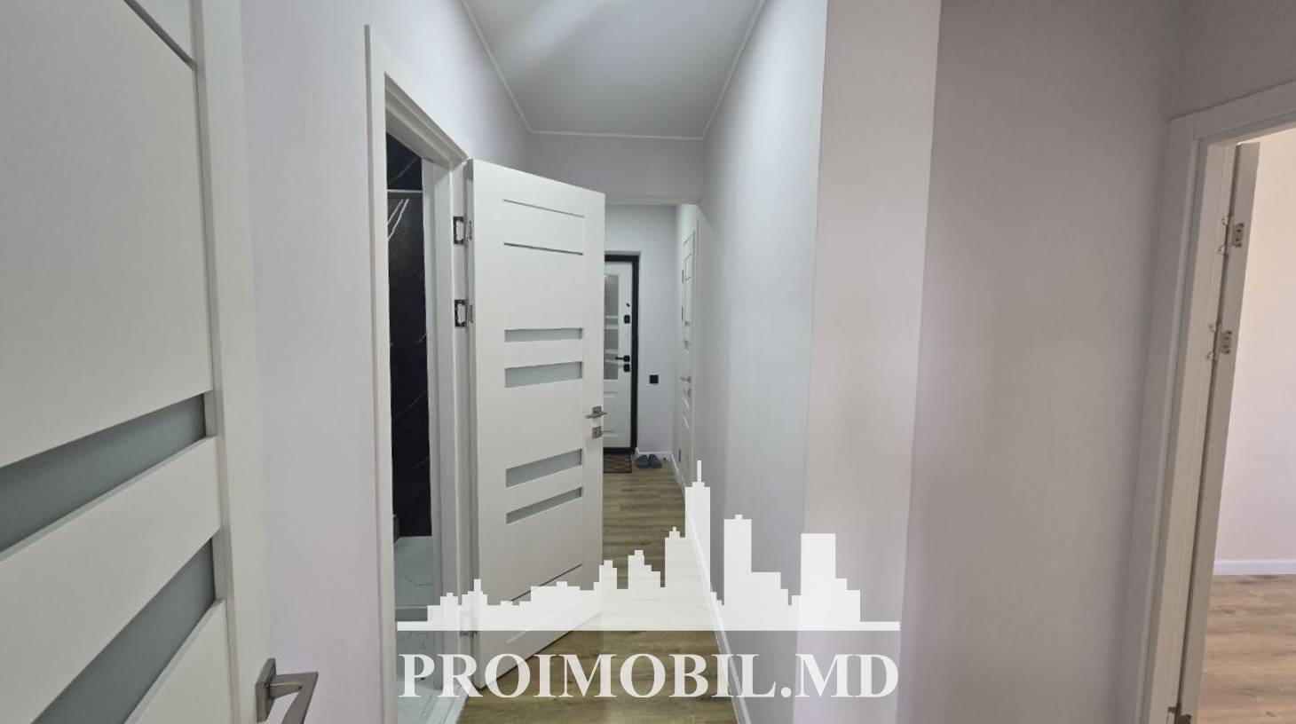 https://images.proimobil.md/tuiu88uuK8EV8IZoZWpsB8sHZBgZ0IOzSSAsJcl9Ooo/watermark:0.75:so:0:30:0.39/resize:fill:1460:816:1/gravity:ce/bG9jYWw6Ly8vZXN0YXRlL2xyLzFkMTQwMjU1LThhOWEtNDg3MC04YjdiLTNkMGRmMjM3NjhmMS5qcGVn