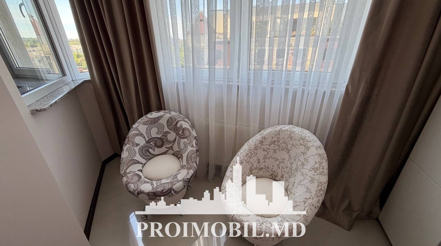 https://images.proimobil.md/uyO5dArn6l-2gGXvFpdBiY_vCraV6VoBda4r4_u_-0I/watermark:0.75:so:0:30:0.39/resize:fill:1460:816:1/gravity:ce/bG9jYWw6Ly8vZXN0YXRlL2xyL2RmY2Y4NmFlLTA0YzUtNGQwNS1hMTdkLWVmYzM4MjQzNWFlZi5qcGVn