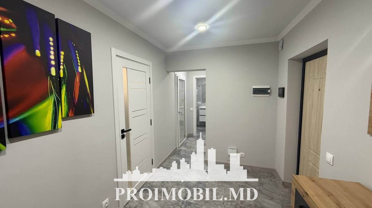 https://images.proimobil.md/vUXr2hq3FospygyyTW9V4xRTkri-t64aQ_-QyqIGTFc/watermark:0.75:so:0:30:0.39/resize:fill:1460:816:1/gravity:ce/bG9jYWw6Ly8vZXN0YXRlL2xyLzg3NGM2MTQ4LThkYTgtNDdlNy05ZjBjLWQ3OWM2NDAzNDc5OS5qcGVn