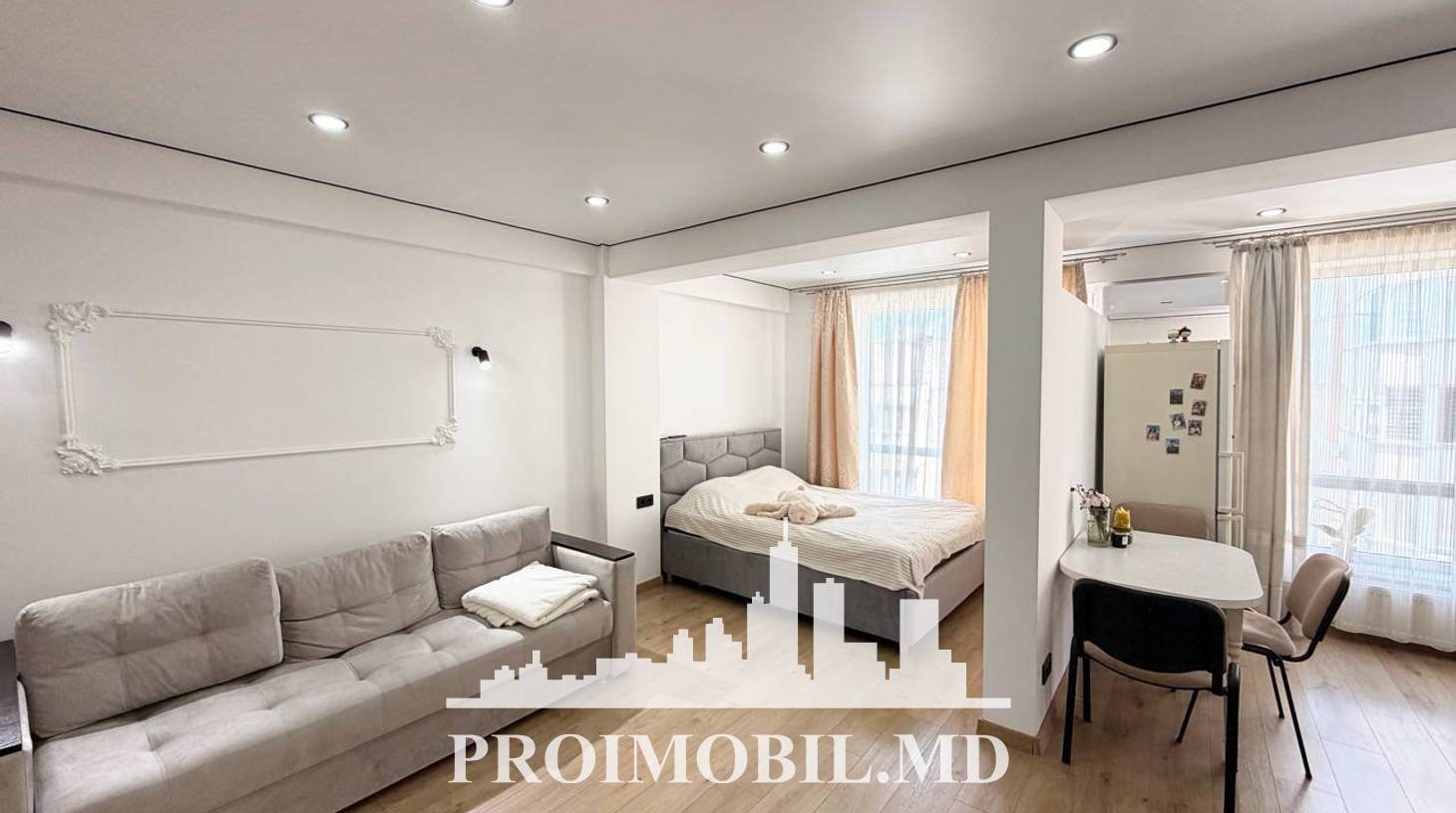 https://images.proimobil.md/vsDlmjUOeSkVRiBAYy4LxHsT9CViP-szSkZhCcS8VWo/watermark:0.75:so:0:30:0.39/resize:fill:1460:816:1/gravity:ce/bG9jYWw6Ly8vZXN0YXRlL2xyLzZjM2FiYWJiLTRiZGQtNGVhNC1iNTRkLTc2M2UxOGVlZWE2ZS5qcGVn