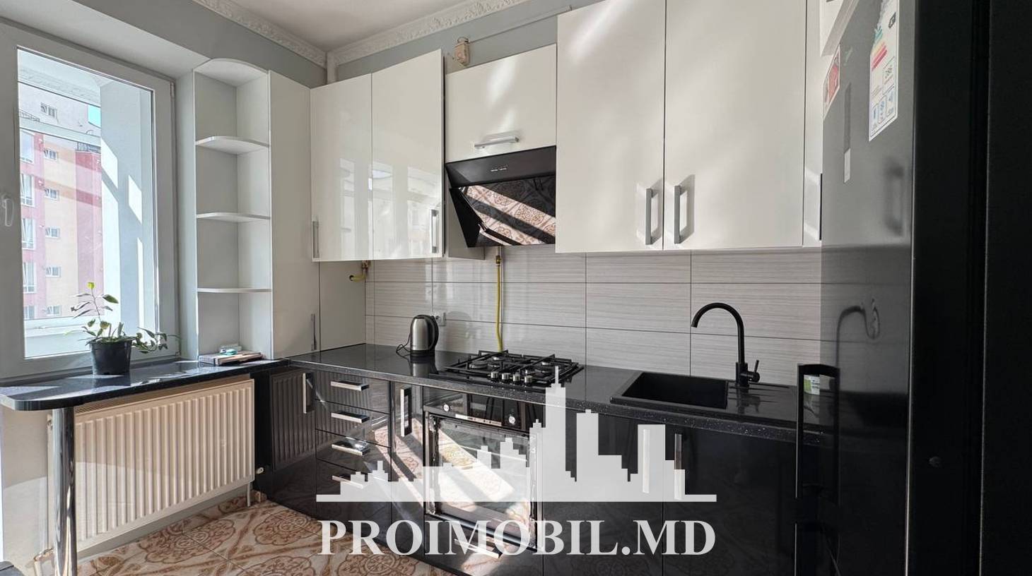 https://images.proimobil.md/wkz_-mi8_P1TLbxlOtrpxzGF0bLibN27oqpEDf-3sPE/watermark:0.75:so:0:30:0.39/resize:fill:1460:816:1/gravity:ce/bG9jYWw6Ly8vZXN0YXRlL2xyL2U0NGFmOTYwLTdiY2MtNDBkOS1hNzM3LWRlMGNlZTVmZGZiMC5qcGVn