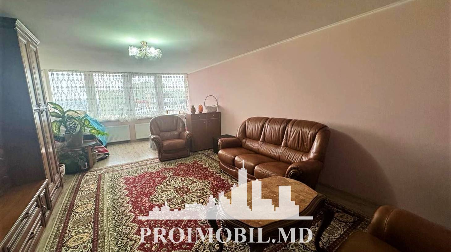 https://images.proimobil.md/xMJb_y2y2R7aqi73pC2K_f-uPUptHu3ixJK1_njcUX0/watermark:0.75:so:0:30:0.39/resize:fill:1460:816:1/gravity:ce/bG9jYWw6Ly8vZXN0YXRlL2xyLzBmZDJkZTdhLWFiNjAtNDhlZC04ZWUzLTMwNDlmZDQ3YmRjZC5qcGVn