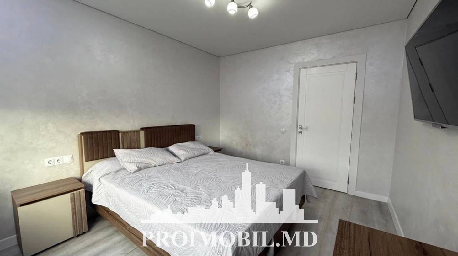https://images.proimobil.md/xpNi_3EPbYMr2lcUTqCtJQn1w2AVtuvbQr8M5R_3nWs/watermark:0.75:so:0:30:0.39/resize:fill:1460:816:1/gravity:ce/bG9jYWw6Ly8vZXN0YXRlL2xyLzZkYzMxMmQ5LTUwM2YtNDc4OC05NjM0LTViNDcxYjJlNzlhYi5qcGVn