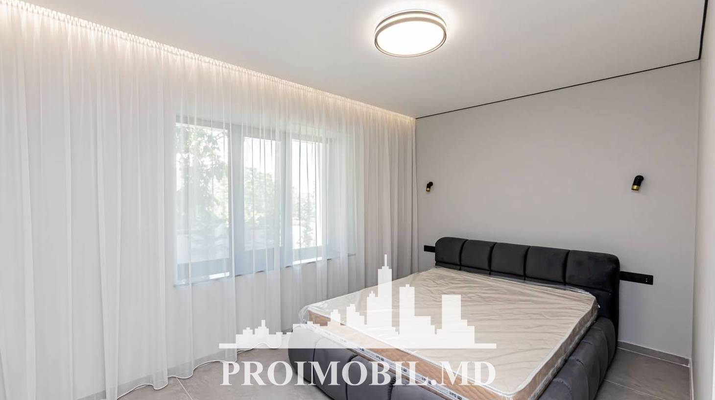 https://images.proimobil.md/z3YnLf_mId1o787Igt_ZQAmMqpr30K93uLs7fa5F-j8/watermark:0.75:so:0:30:0.39/resize:fill:1460:816:1/gravity:ce/bG9jYWw6Ly8vZXN0YXRlL2xyLzVhYzVlYWRkLTkzODEtNDliZC05YjEwLTliMjhkNzM0MGM3Yi5qcGVn