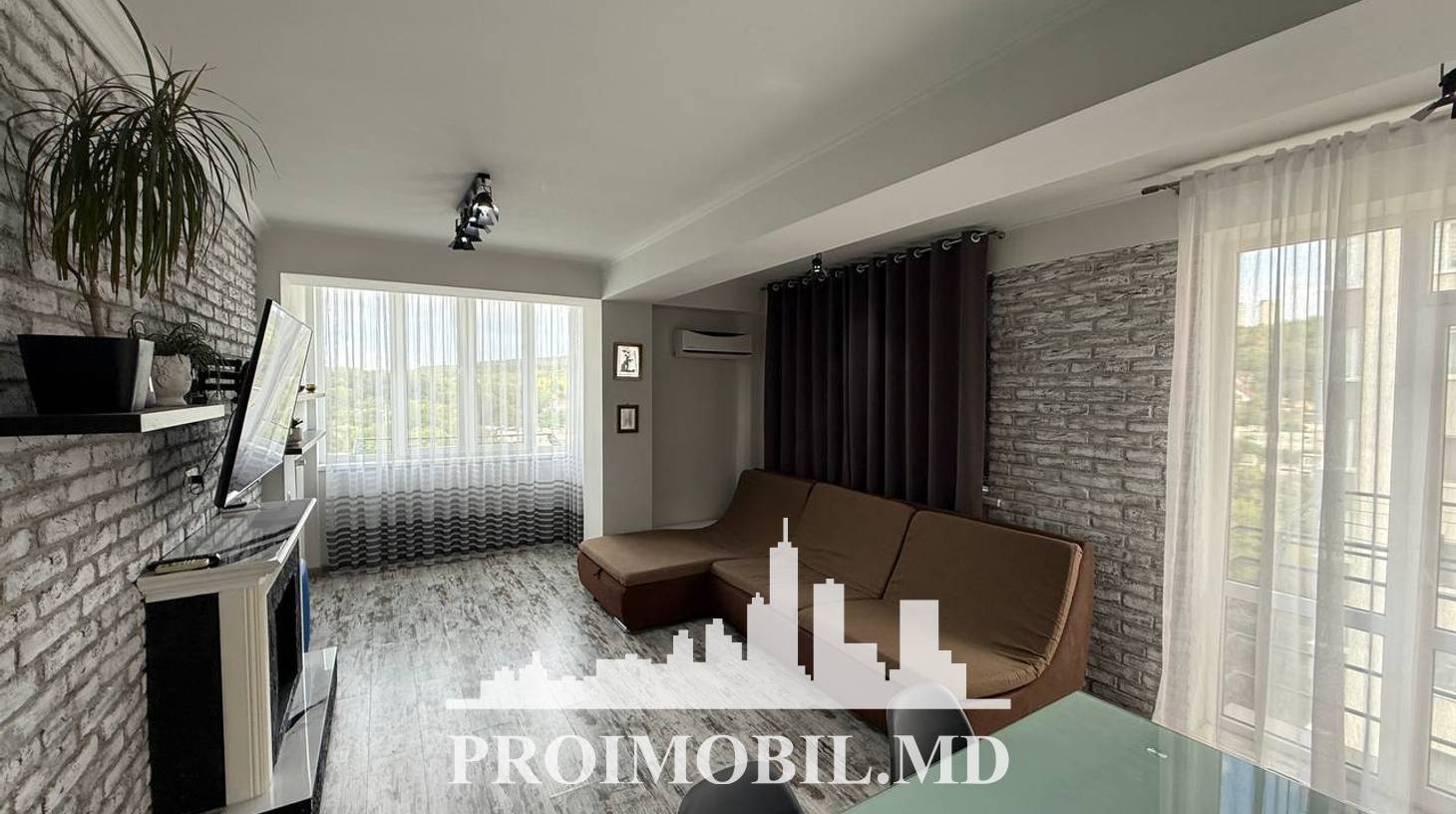 https://images.proimobil.md/zfDmQbigAcI2xwKNXRse2Oz0Gn1F55WNldY3yD_Nq1g/watermark:0.75:so:0:30:0.39/resize:fill:1460:816:1/gravity:ce/bG9jYWw6Ly8vZXN0YXRlL2xyLzNmYmE5OTQzLTAzNDMtNDdiYS1hNDgyLTUwMWFiNzc1Y2IxZS5qcGVn